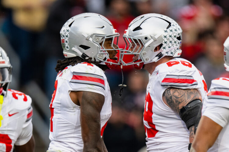 Top-ranked Ohio State faces Rutgers with uncertainty over star receivers